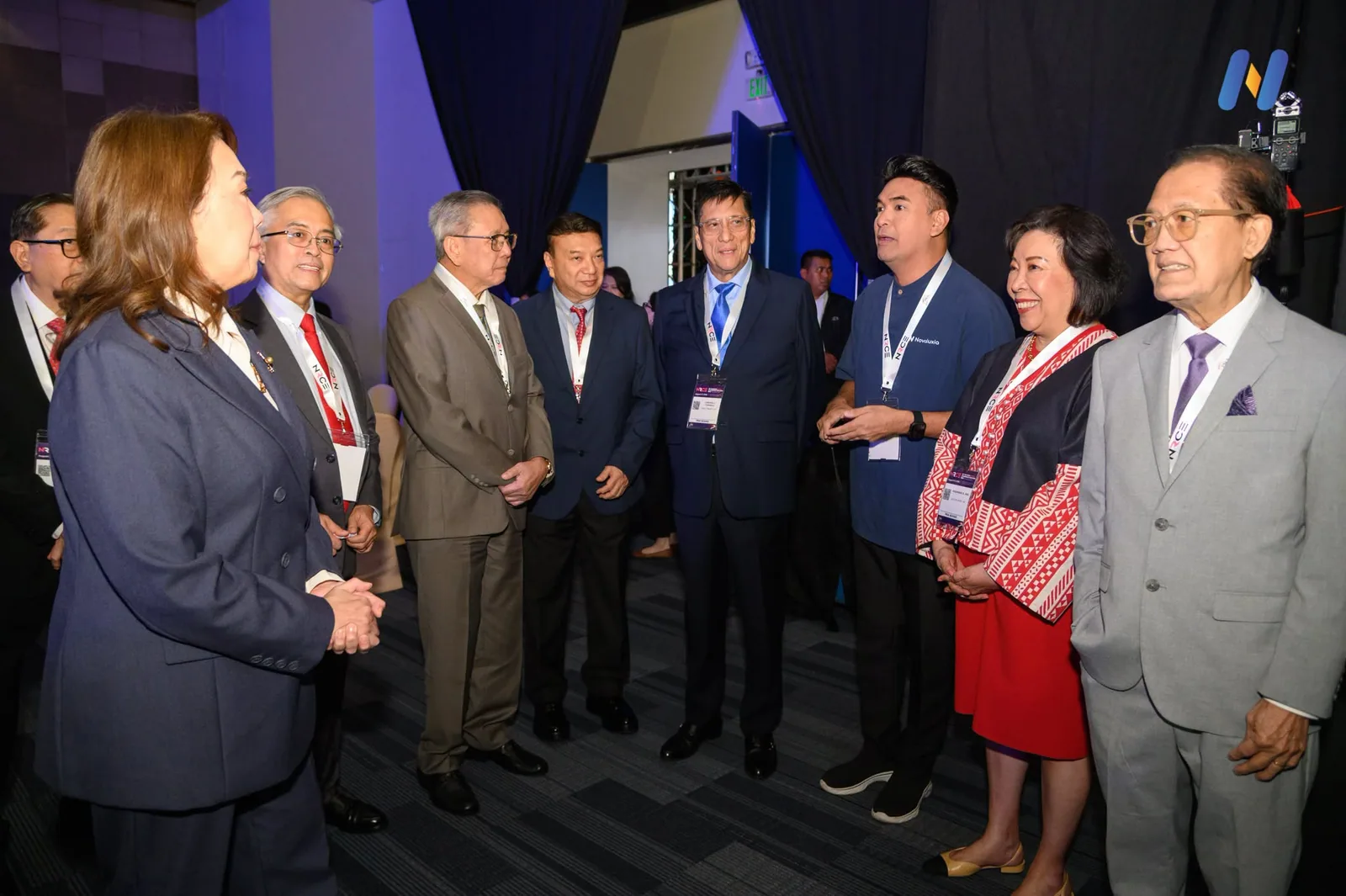 Novaluxia PH delegates photographed together in a hotel lobby between summit sessions in Manila